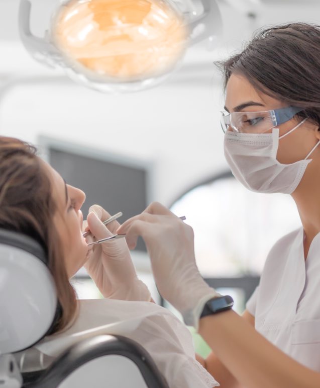 Women getting Work done from Female Dentist