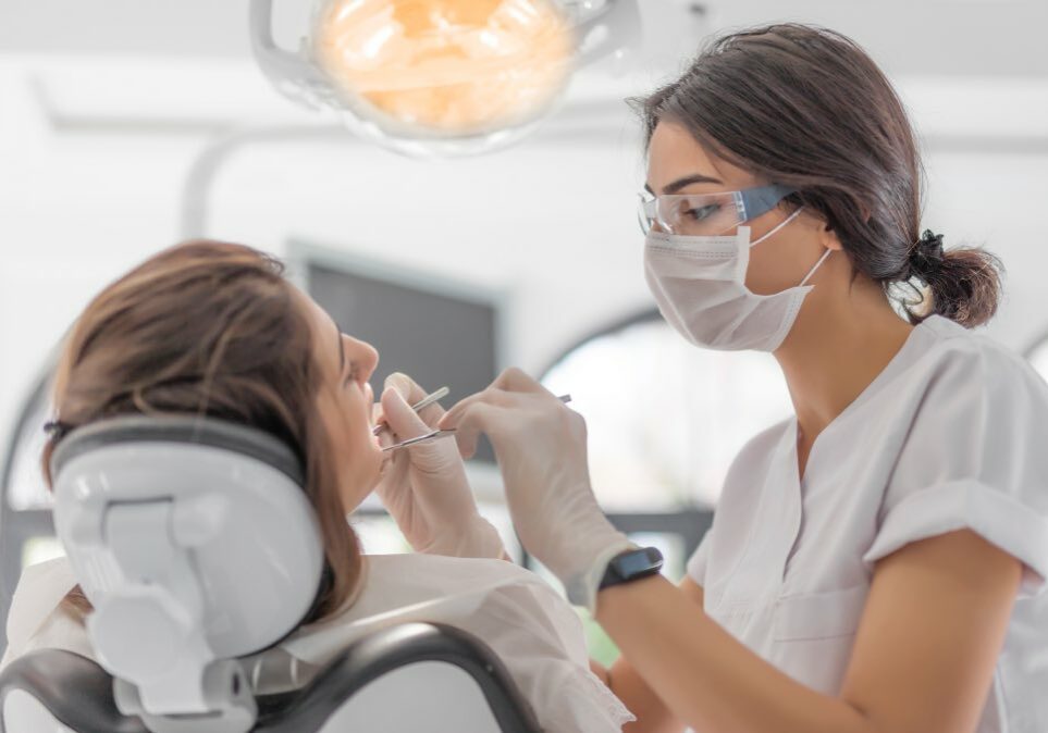 Women getting Work done from Female Dentist